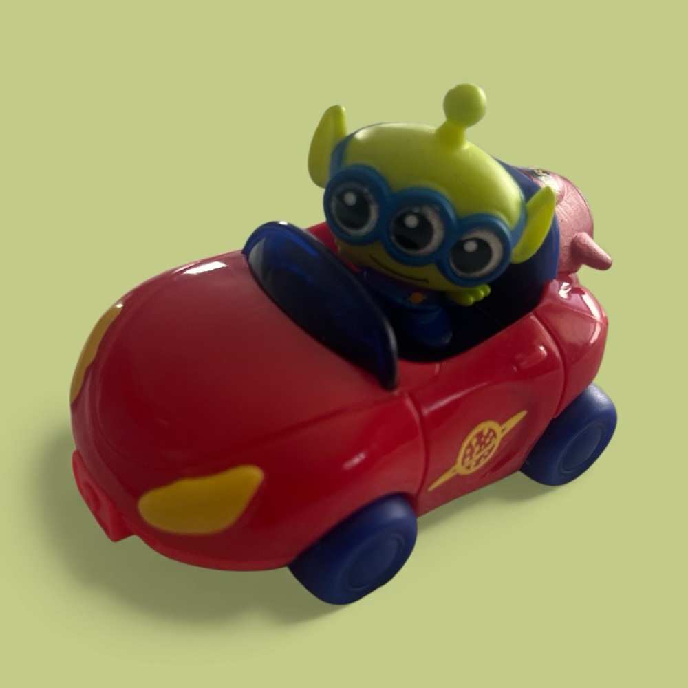 Disney Red Alien Toy Car with Blue Wheels